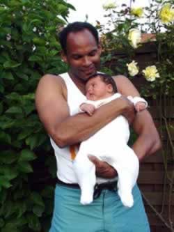 Dixon and Papa in yard August 2002