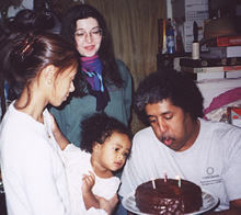 ariana helps blow out the candles