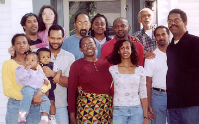 group shot number 1. After I finally got out of the shower. L to R is Karen holding Ariana, David, Tatiana, James holding Justin, Sherwood, Marie-Claire (Isabelle is in hiding), Jo-anne, Claude, Deborah, Uncle Leon, Anthony and Wayne.