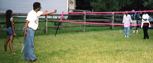 kathy, wayne playing badminton